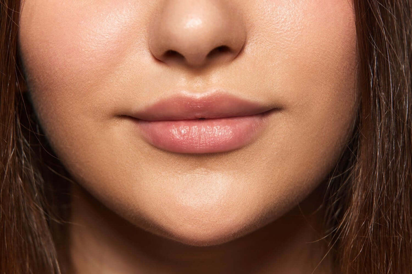 Close-up of smooth lips showcasing healthy hydration, ideal representation for Lip Balm - Grape.