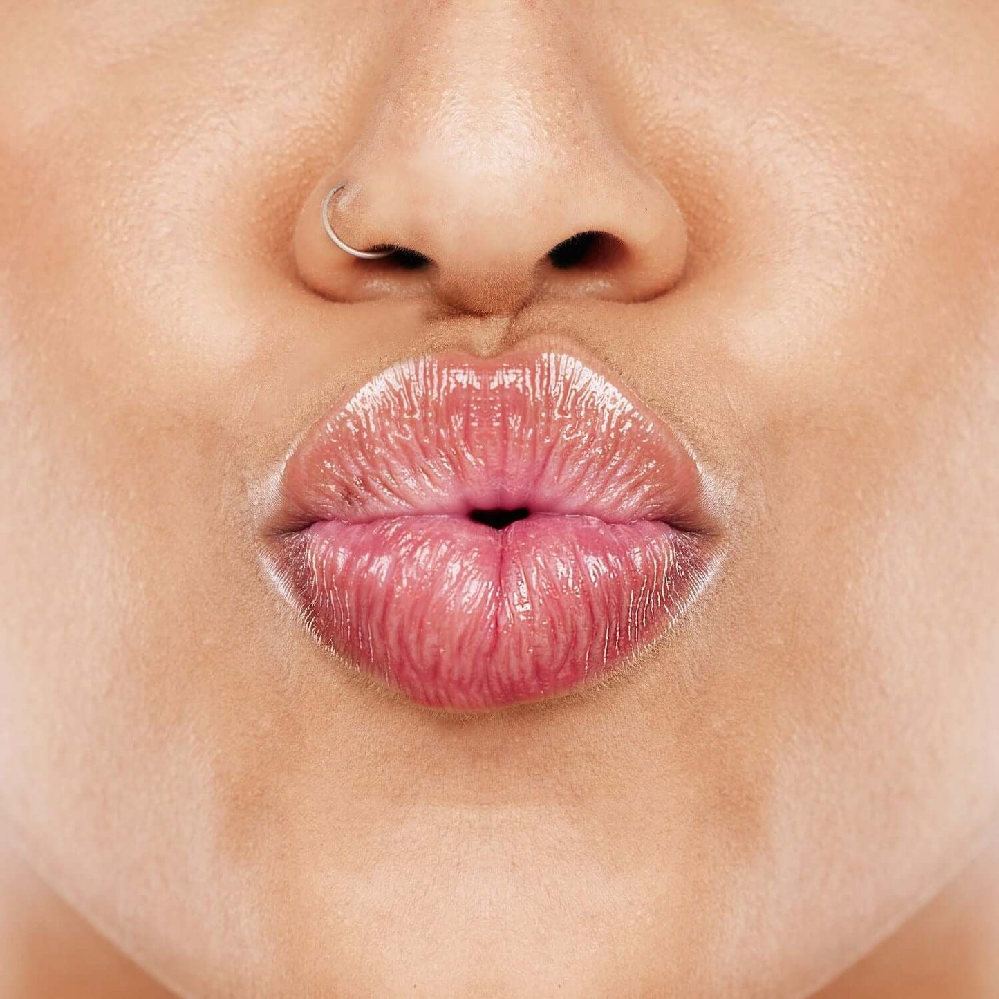 Lip Balm - Grape enhances lips with a glossy finish and deep hydration for soft, healthy lips.