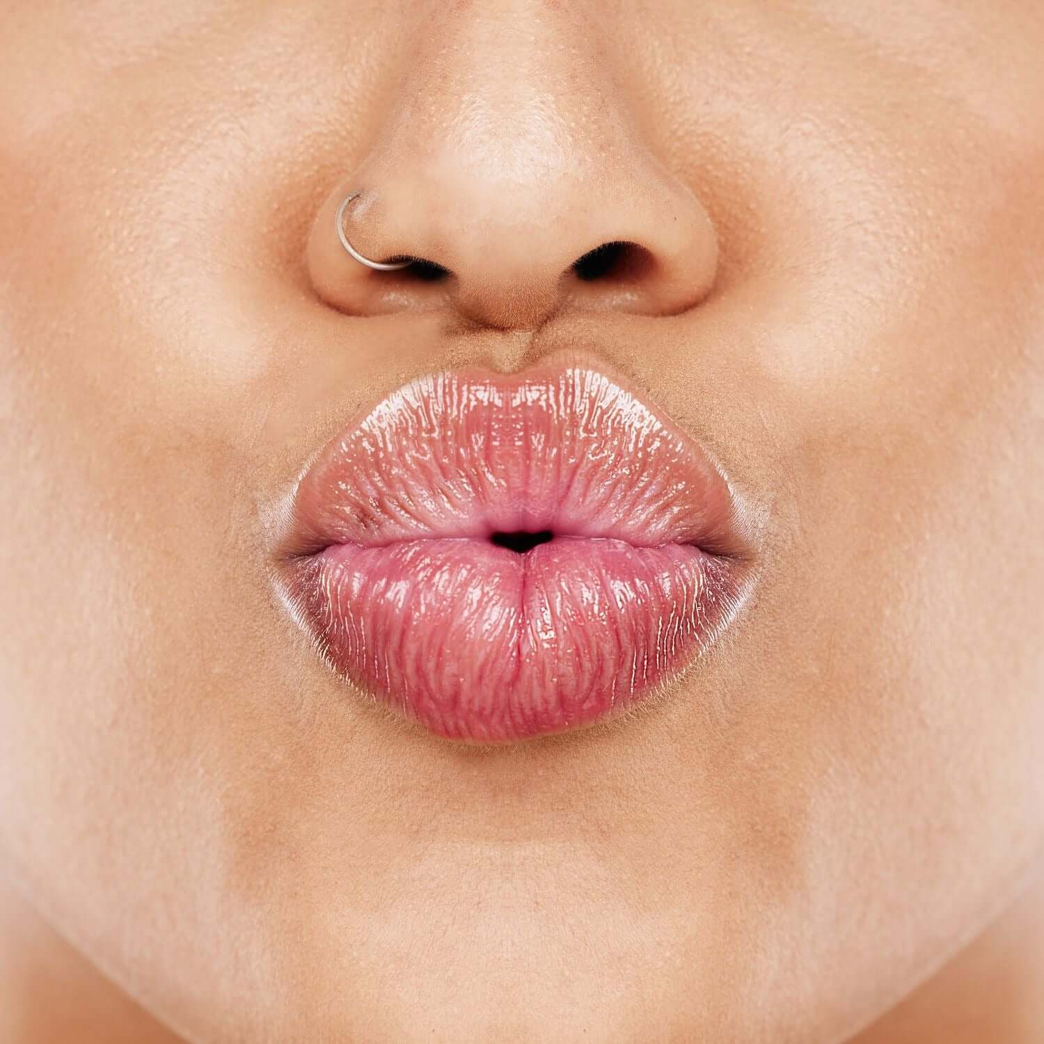 Lip Balm - Grape enhances lips with a glossy finish and deep hydration for soft, healthy lips.