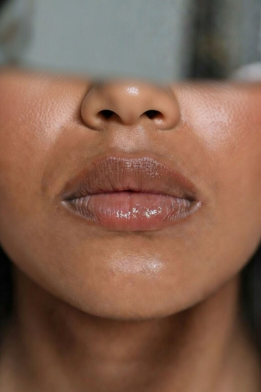Close-up of smooth and hydrated lips showcasing the benefits of the Lip Care Deluxe Bundle.